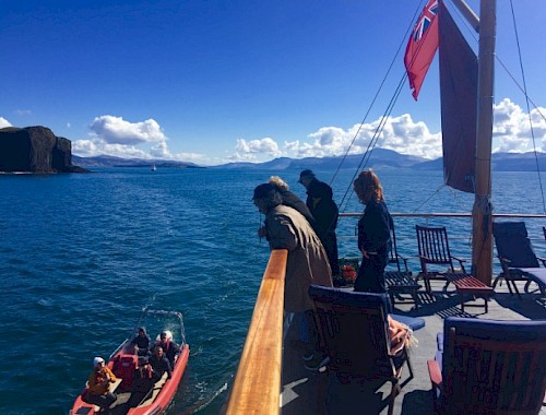 Guests coming back aboard after visiting Staffa